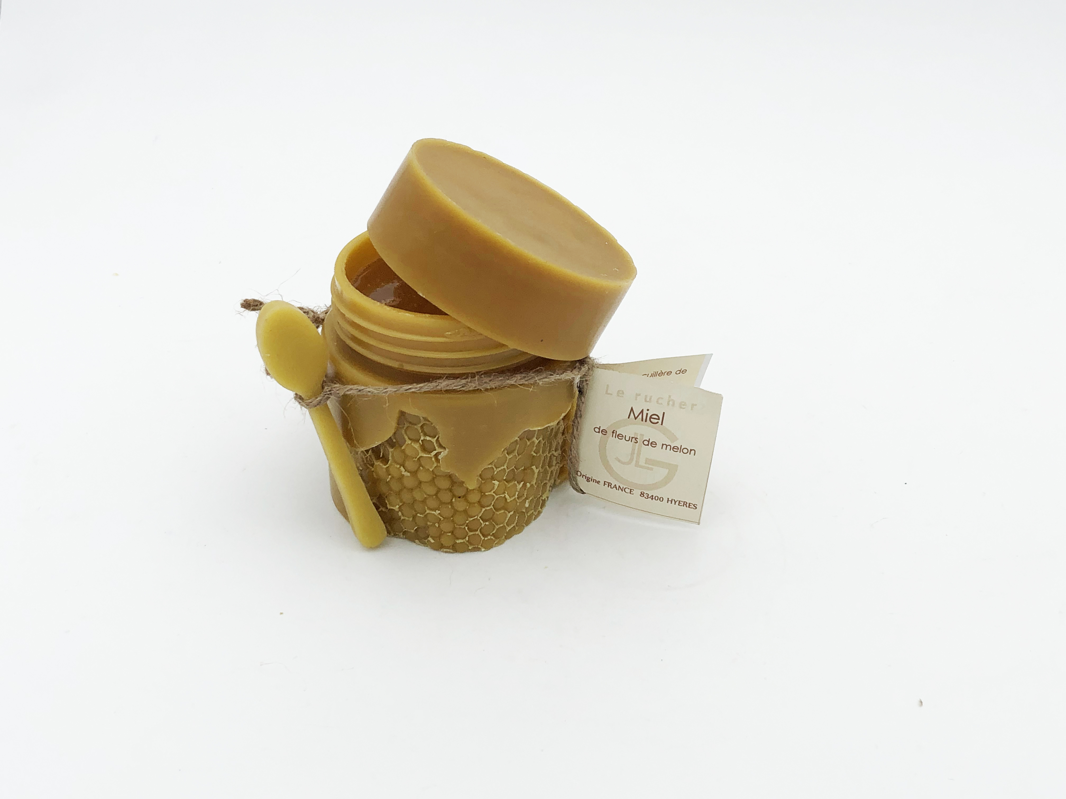 Pot rond en cire d'abeille avec miel de melon